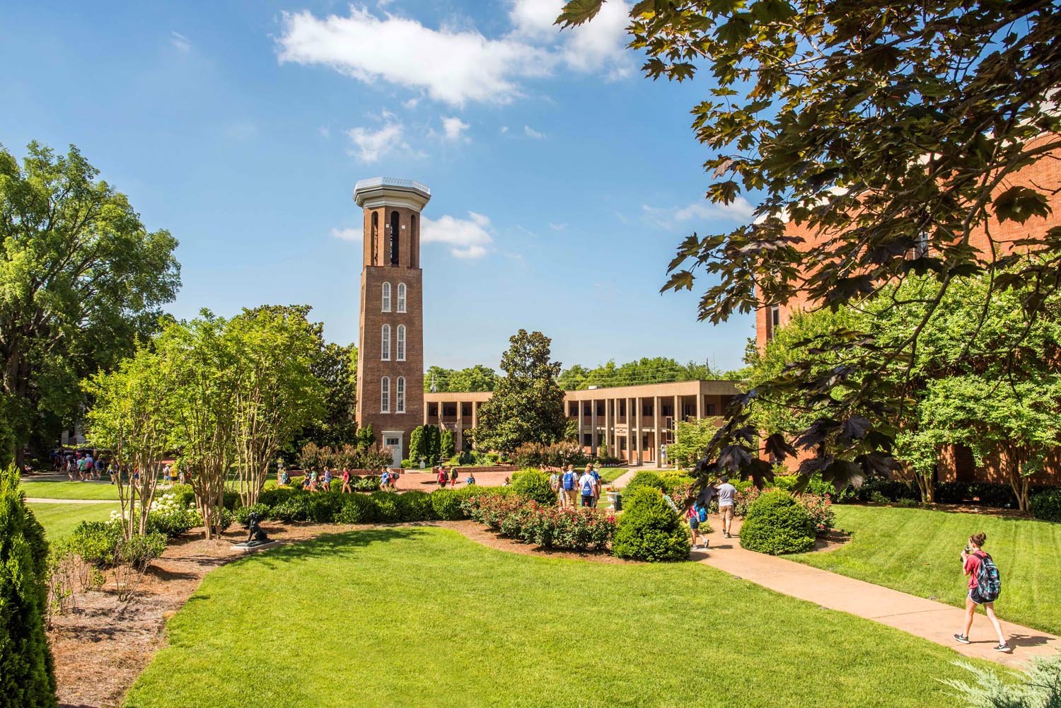 Belmont University's campus, with green lawns and students walking between buildings