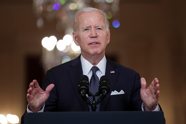 President Joe Biden, an older man with white hair wearing a suit and tie.