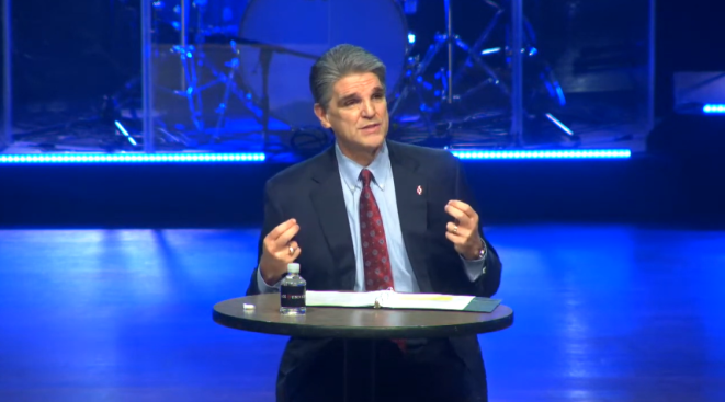 Mark Walker, a middle-aged white man with gray hair wearing a suit and tie.