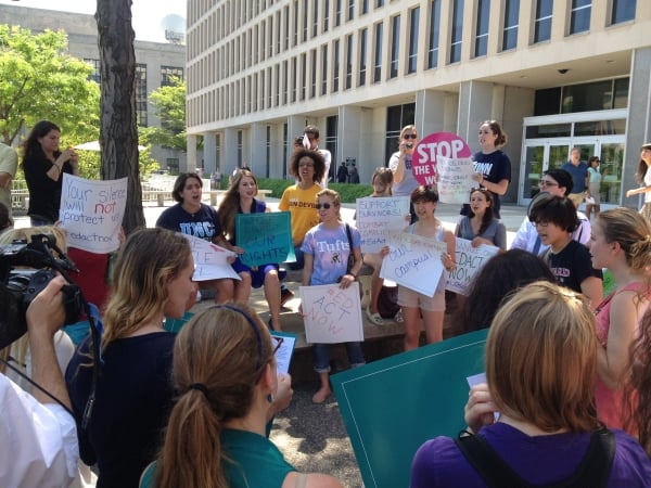 Students and activists protest outside the U.S. Education Department. (Credit: Allie Grasgreen)